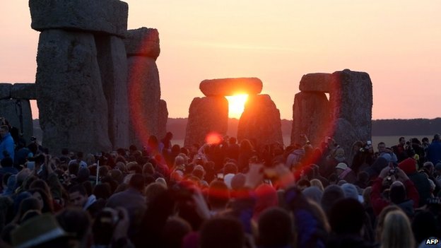 Witnessing the sunrise of a midsummer day at the Stonehenge. (Photo courtesy: AFP)