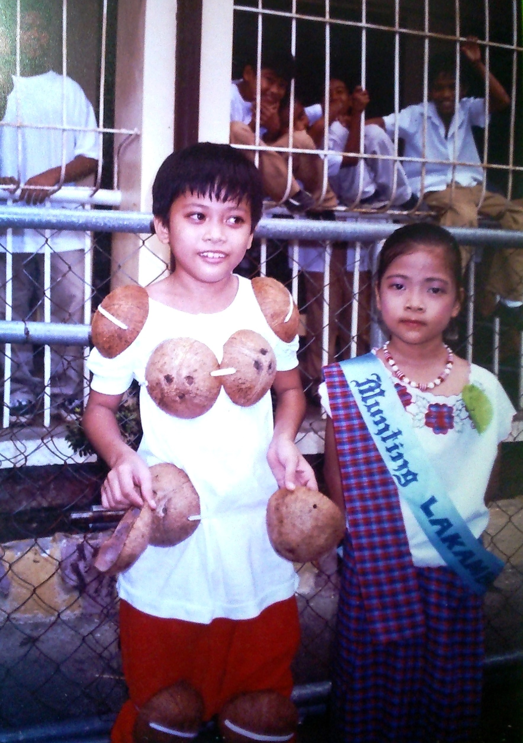 My brother as a maglalatik and myself as a contestant for 'Munting Lakambini'