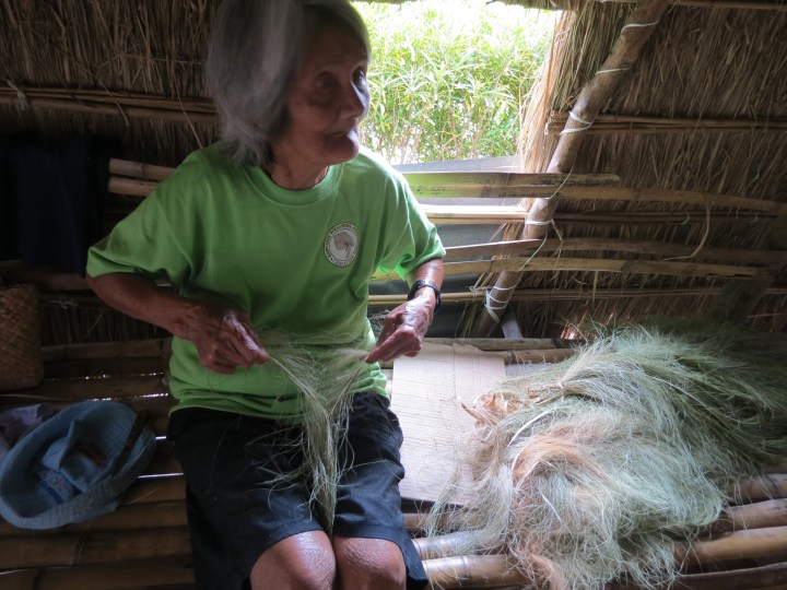 Lola Emila, an Ivatan weaver shows me how to weave fresh buyaboy into a vakul