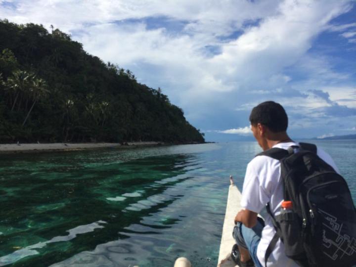 Manny Janoyan sails to Limasawa Island every school year to teach children. (Photo by Lian Buan)