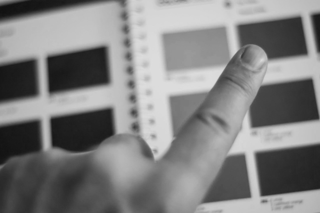 finger pointing to choices